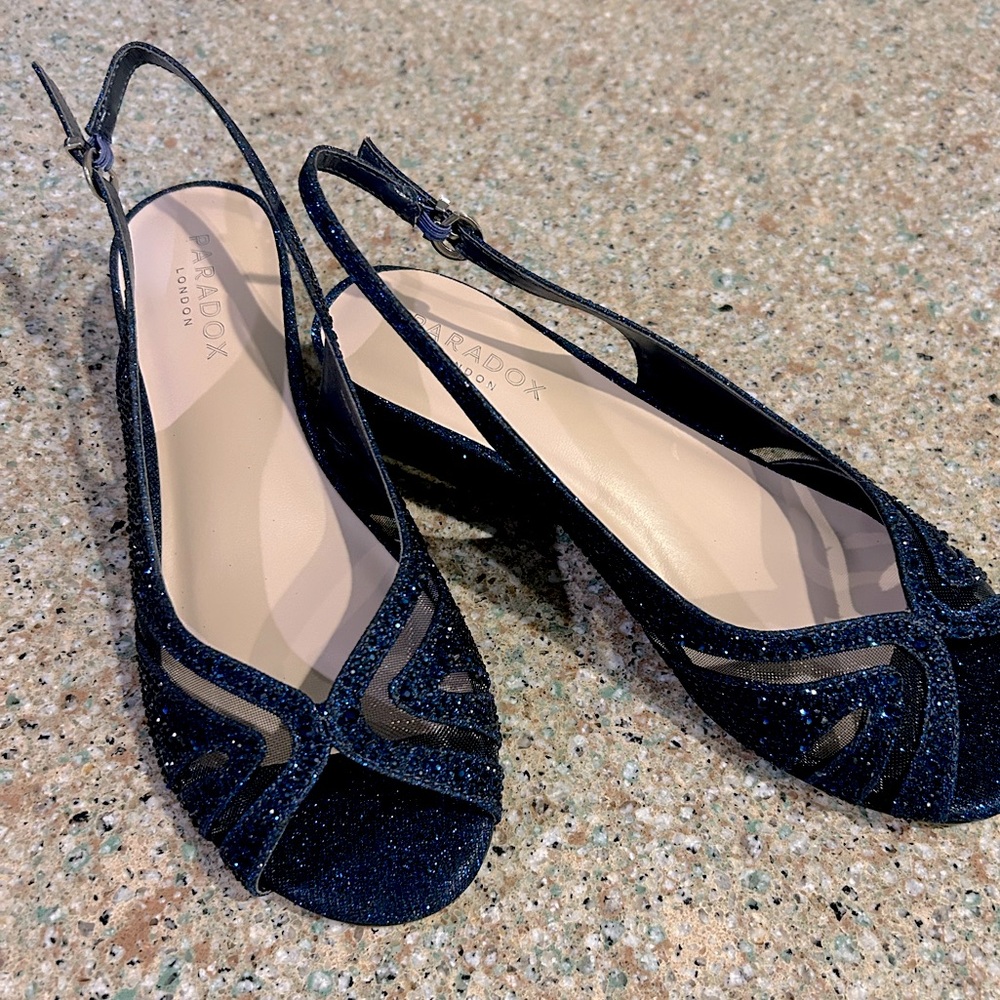 NEW NEVER WORN METALLIC NAVY BLUE WOMENS WEDGES. SIZE 9 MEDIUM